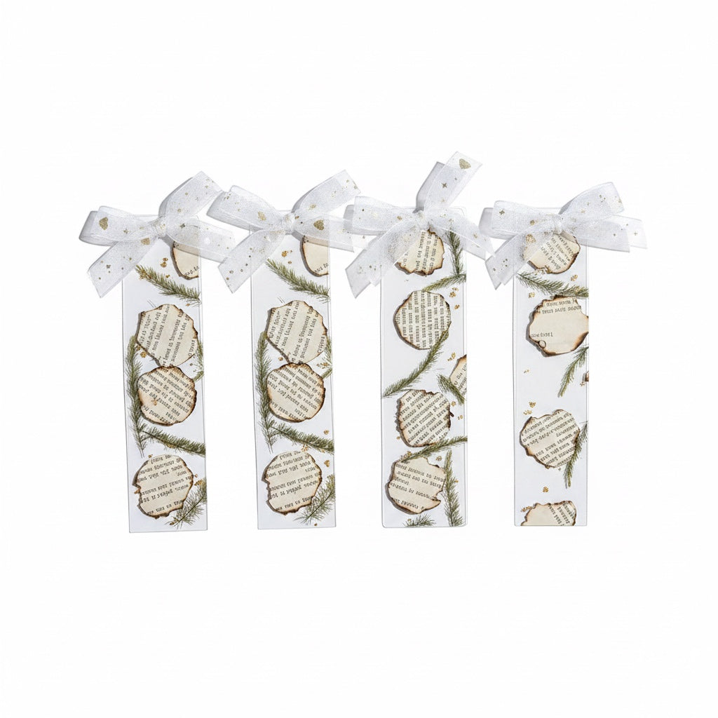 The J.M Press Silvered Forest Trio bookmarks feature burnt-edge paper designs with pine sprigs and white ribbon bows.
