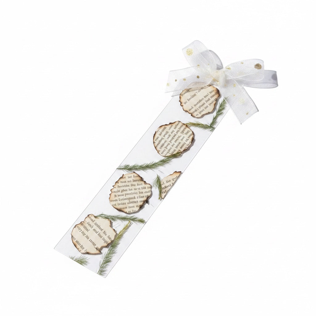 The J.M Press Silvered Forest Trio bookmarks with burnt paper accents and green sprigs, tied with a white ribbon.