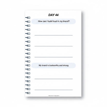 The J.M Press Affirmed In Business Pocket Diary, Volume One, open to Day 44 with prompts on building brand trust.
