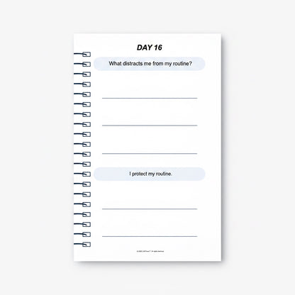 The J.M Press Affirmed In Business Pocket Diary, Volume One, Day 16 page with prompts about routine and distractions.