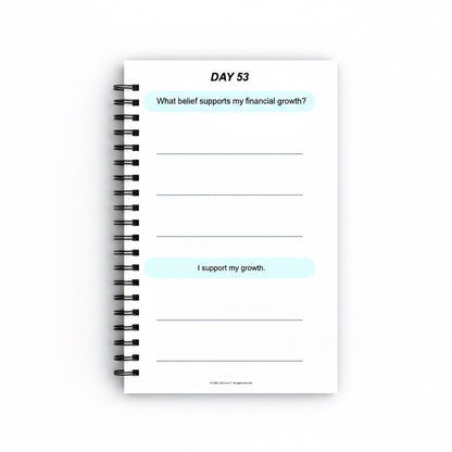 The J.M Press Affirmed In Business Pocket Diary Volume One, spiral-bound notebook with prompts for financial growth and affirmations.